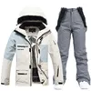 Tuta da sci per uomo e donna Abbigliamento da snowboard Set da esterno Giacche e pantaloni Abbigliamento invernale Costume da neve impermeabile 2024 231220