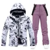 Set di tute da neve impermeabili per donna Abbigliamento da snowboard Costumi da sci Abbigliamento invernale Giacca con cinturino Pantalone per ragazza Colori 231220