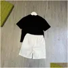 Set di abbigliamento Completo per bambini T-shirt per ragazzi Ragazze Bambini Top a maniche corte Bambino Designer Clother con lettera Nero Taglia 90-160 Drop De Dhucw