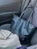 Luxury Designer Bags Sagas de Celins 2023 NOVA bolsa de verão para mulheres universitárias de grande capacidade Compras de compras ombro com logotipo real