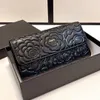 Luxury Designer Women Folding Wallet Classic French Brand Two Letter Fashion Lady Coin Purse Black Clutch Bags Relief äkta läder Camellia Multi Credit Card Bag