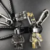 Pièces de sac Accessoires Géométrique Hiphop Punk Gear Robot Porte-clés En Cuir Corde En Métal Anneau Pendentif Pour Hommes Femmes Personnalité Cyberpunk Porte-clés 231219