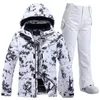 Set di tute da neve impermeabili per donna Abbigliamento da snowboard Costumi da sci Abbigliamento invernale Giacca con cinturino Pantalone per ragazza Colori 231220