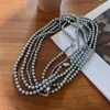 Choker-Perlenkette im französischen Stil für Frauen mit hochwertiger Schlüsselbein-Halskette, silbrig-grauer, runder, heller Schmuck X158