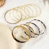 Bangle 10pcs luksusowe złote bransoletki bransoletki bohemian wielowarstwowe geometryczne kryształowe perły duże koła Braclety dla kobiet prezenty