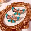 Stud Earrings Antique Glazed Butterfly