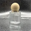 Bouteille de parfum haut de gamme 30ML avec bouchon à bille, bouteille de pulvérisation de parfum en verre à barre verticale portable, bouteille vide