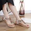 Sandaler Summer Women's Border Casual Flat Shoes Plus Size storlek Etnisk stil strängpärlor för kvinnor med tåavskiljare