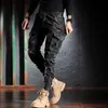 Męskie dżinsy projektant mody Mężczyźni dżinsy kamuflażowe spodnie wojskowe LTI Pockets Casual Cargo Pants Hombre Zipper Bottom Hip Hop Joggers L231220