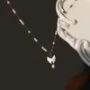 Chaînes White Shell Butterfly Pendentif Collier de perles d'eau douce pour femmes en acier inoxydable couleur or chaîne charme bijoux réglable