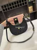 Designer Minutminut Leather Hobo Bag Half moon package Underarm Bag Handbag Single Shoulder Bag Luxury Metal Engraved Logo Lock Buckle Open High Quality Women's Bag