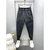Mäns jeans vårens höst svart jogger byxa pläd rand svettbyxor mager harem byxor i högkvalitativa designer märke kläder
