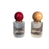 30ML high-end parfumflesje met baldop draagbare verticale staaf glazen parfumspuitfles Lege fles