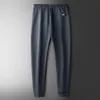 2023 novo produto outono high end calças casuais masculinas tubo reto solto leggings esportivos atacado de calças de outono masculino
