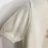 Дизайнерская футболка Женская одежда Вязаный топ с плюшевым логотипом Шерстяной вязаный свитер с коротким рукавом Модная универсальная футболка Женские футболки Свитера