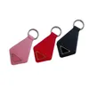 porte-monnaie porte-clés sac pendentif cordons de sac Porte-clés boucle cuir rouge Porte-clés unisexe polyvalent sac Accessoire ornement cuir noir porte-clés ensemble cadeau 1