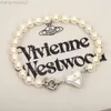 Designer viviviene Westwoods Viviennewestwood Imperatrice vedova Vivian's Trumpet Love Saturn Bracciale con perle Design di nicchia femminile Bracciale in resina color pesca Versione alta