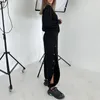 Tenue de pantalon à deux pièces pour femmes Pull à manches longues à manches longues à manches à manches à manches simples de la mode ouverte de la mode femme