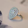 Anillos de boda Corte de pera Zafiro blanco CZ Piedra para mujeres Solitario Anillo de compromiso Banda Joyería de moda Encanto