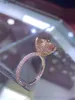 Anello solitario squisito squisito zircone cubico di lusso in oro rosa sotto anello nuziale di alone con reggti di cristallo taglio di fidanzamento a morganite Ringl231220