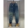 Calças de brim masculinas moda casual jogger harem calças jeans hip hop nova cintura elástica carta impressão calças jeans 2023 outono l231220