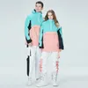 Moda snowboard terno das mulheres dos homens de esqui conjunto com capuz inverno à prova de vento à prova dwindproof água quente jaqueta calças terno de esqui macacão de neve 231220