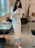 Robes de travail Automne Doux Vintage Tricoté Deux Pièces Ensembles Femmes Flods Designer Casual Streetwear Midi Jupe Costume Femme Coréenne Chic Ensemble 2023