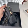 Kadın için Mini Siyah Beyaz Sırt Çantası Zincir Crossbody Bags Yüksek kaliteli elmas kafes arka paketi deri tasarımcı çanta düz küçük sırt çantaları kuzu derisi çanta