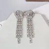 Pendientes colgantes Geometría de lujo Estereoscópica Flor Borla Pendiente para boda Fiesta de compromiso Vestir Joyería de circonia cúbica Mujeres A0254