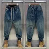 Calças de brim masculinas moda casual jogger harem calças jeans hip hop nova cintura elástica carta impressão calças jeans 2023 outono l231220