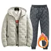 Homens de moda define o inverno coreano à prova de vento quente e masculino, polyster zíper de zíper para calça de 2 peças de 2 peças de traje masculino 4xl 231220
