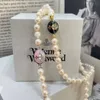 2022 سلسلة جديدة لتصميم الترقوة ، ليزا ، نفس النمط الإمبراطورة Dowager Saturn Pearl Necklace for Women