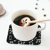 Tovagliette da tavolo Note musicali bianche su sfondo nero Sottobicchieri Tovagliette da cucina Tazza isolante Caffè Stoviglie per la casa Set di 4