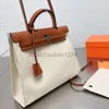 مصمم حقيبة Herbagity 5A حقائب الجودة حقيبة مصممة لأجهزة iPad Canvas Witleather Totes كبيرة السعة الشهيرة حقيبة اليد الشهيرة حقيبة حقائب حضرية أبيض العمال