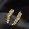 Boucles d'oreilles pour femmes, plume délicate en forme de feuille, couleur argent or, cadeau quotidien de fête, bijoux à la mode 343b