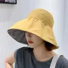 Chapeaux à bord large chapeau seau 2023 Nouvelle femelle coréenne à la mode du chapeau solaire Big Brim Uv Protection Place Vide Top Vide Top Femmes Soleil Double sidedl231221