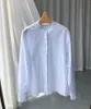 Blusas para mujeres 2023 otoño e invierno Temperamento de las damas de encaje azul blanco pequeño tira vertical camisa de algodón estampado