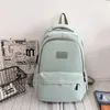 Bolsas de armazenamento Backpack feminino Mochila sólida Múltipla bolso de lazer