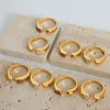 Damer som släpper oljring utsökt hög kvalitet öppen vanlig ring ring rostfritt stål ring pläterad med 18k guldsmodesmycken gåva