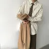 Automne japonais rétro Reverse à rayures luxueuse à rayures pour hommes boutons à manches longues décontractées mode vêtements coréens hawaïen 231221