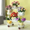 Supports de fleurs portables bon marché avec roues, support de plantes en métal, plateaux de fleurs créatifs, organisateur, grand support de rangement pour la décoration de la maison 2319