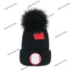 Luxe merk hoed heet verkopen winter wollen hoed voor mannen en dames buiten shopping gebreide trendy warmte big goosse real fur ball cold cold