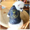 Vêtements pour chiens Vêtements pour animaux de compagnie Chiens Chats avec la même veste en cuir noire rembourrée d'automne et d'hiver Mode hors vêtements de rue