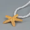 Pendentif Colliers Chaîne de corde Collier d'étoile de mer en métal pour femmes Grand bijoux de mode Accessoires de vacances Style à la mode Cadeau de fête MQ109