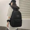 Bolsas de armazenamento Backpack feminino Mochila sólida Múltipla bolso de lazer