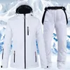 -35 degrés femmes combinaison de Ski veste de snowboard hiver coupe-vent imperméable vêtements de neige veste de Ski thermique et pantalon de neige à sangle 231220