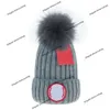 Luxe merk hoed heet verkopen winter wollen hoed voor mannen en dames buiten shopping gebreide trendy warmte big goosse real fur ball cold cold