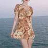 Kvinnors badkläder 2023 Summer Kvinnor Floral Print Ruffle Lace Up One Piece Swimsuit Slim V Neck Short Sweet Push Mini Dress Beach