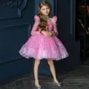 2024 Puffy Shiny Sequined Pink Flower Girl Dresses For Wedding Princess Long ärms Party Pageant First Communion Gowns For Kid