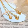 Hänghalsband titanstål guldpläterad mode kubansk länkkedja nisch design naturlig sötvatten pärla inlagd formad halsband